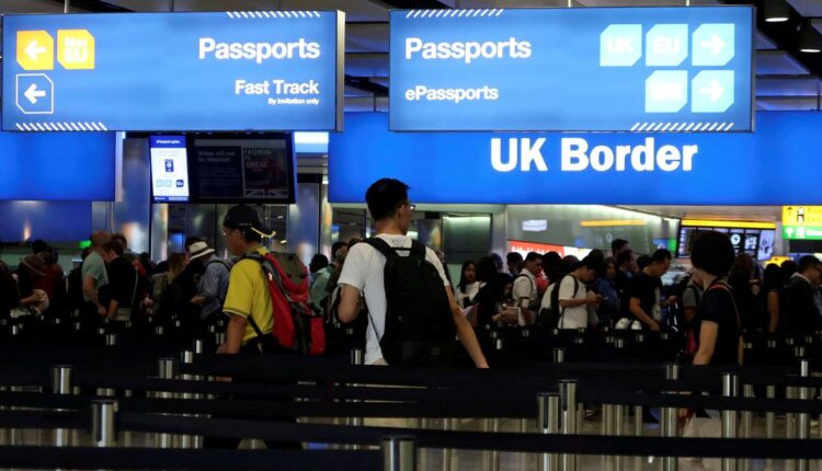 U.K. tightens immigration rules to curb record high migrant numbers