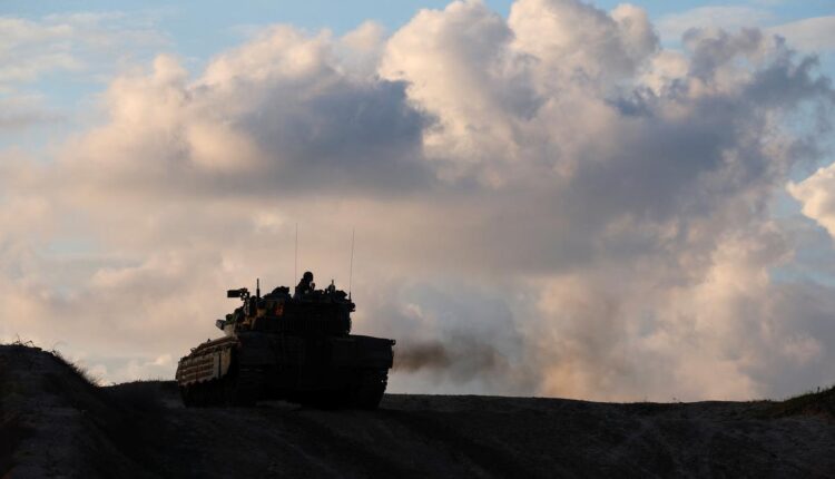 Israeli tanks pound hospital districts in south Gaza, displaced set to flee anew